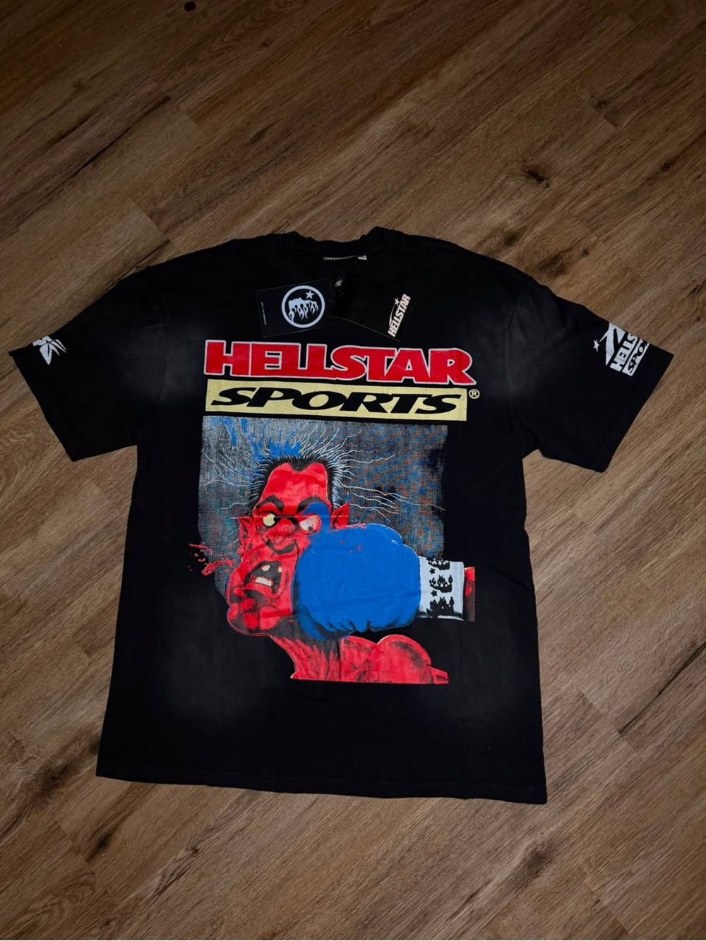 Helstar Sports Men’s Black Short-Sleeve Graphic Tee with Red & Blue Artwork